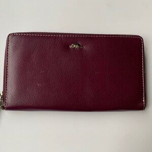 Roots Genuine Leather Zip Around Wallet Burgundy with Tassel & Beaver Charm